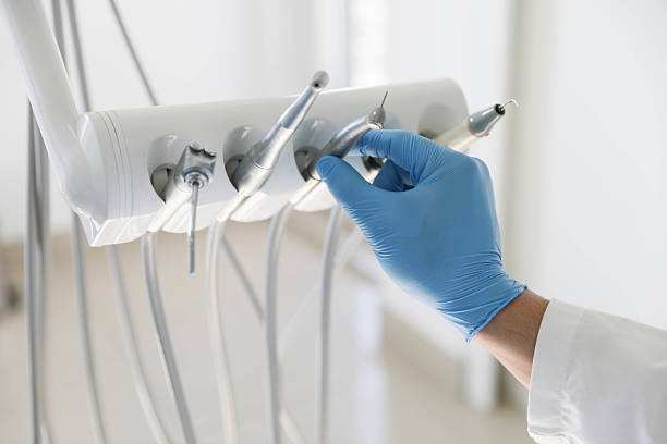 Professional Tooth Extraction technician working in Marshall County County, MS